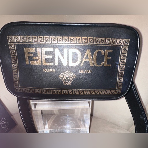 Authentic FENDACE Camera Crossbody
Fendi x Versace Collaboration | Black & Gold - Picture 2 of 14